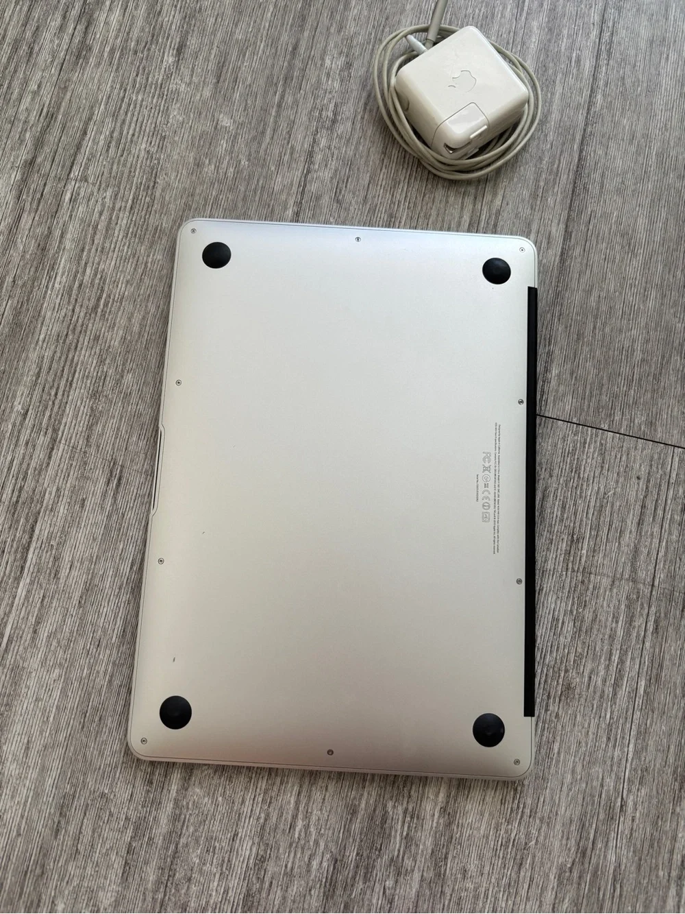 Apple Laptop in Silver with Charger Cord